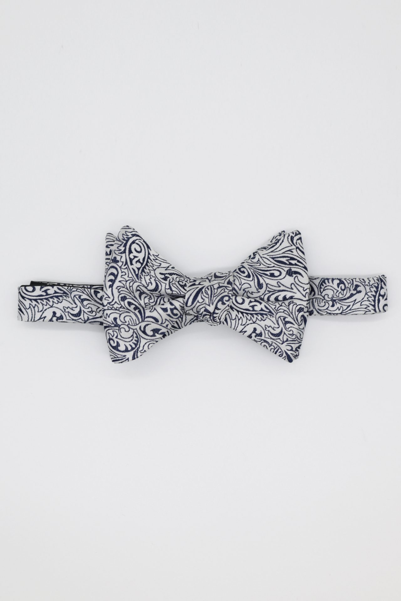 white flower navy bowtie dgrie